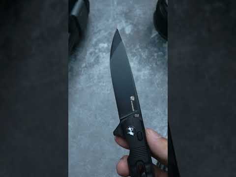 HX OUTDOORS DARK MASTER | Navaja de bolsillo | Cierre de botón | Hoja D2 de 8 cm | Mango G10 negro | ZD-112B